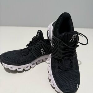 On Running Black and White Sneakers